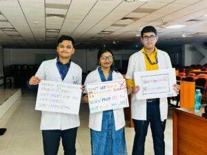 Medical students holding awareness posters during the Behind the Label campaign to promote mindful food choices.